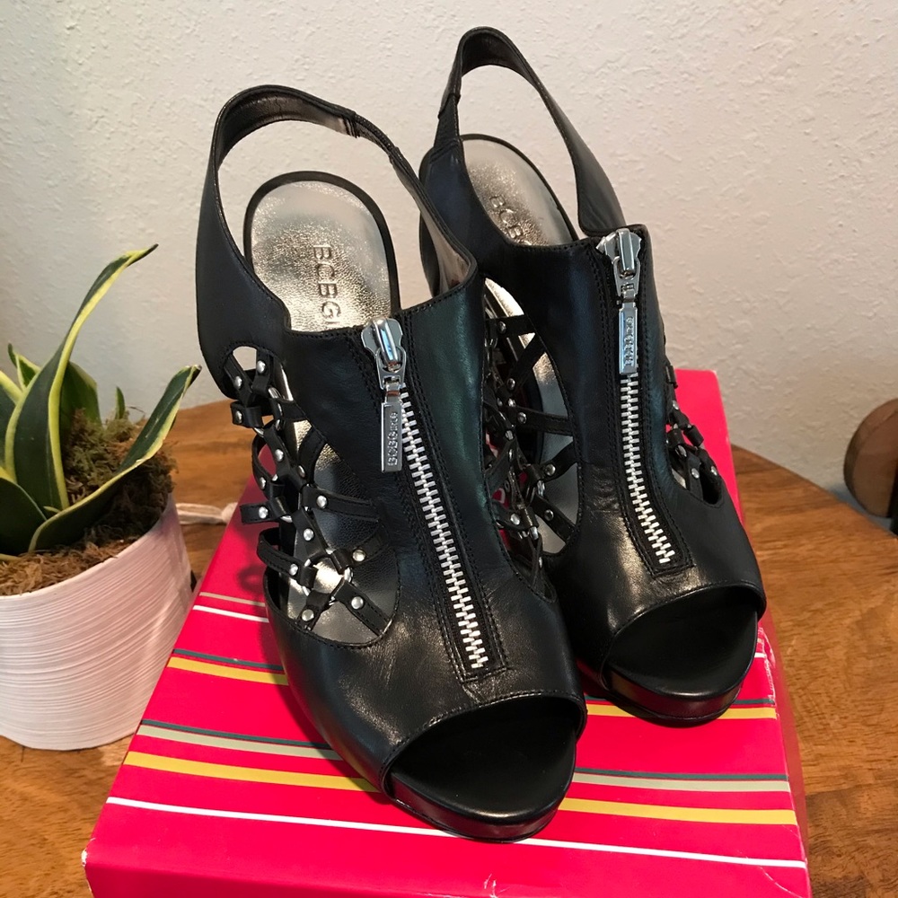 BCBGirls Black Calf bootie heel. Size 8